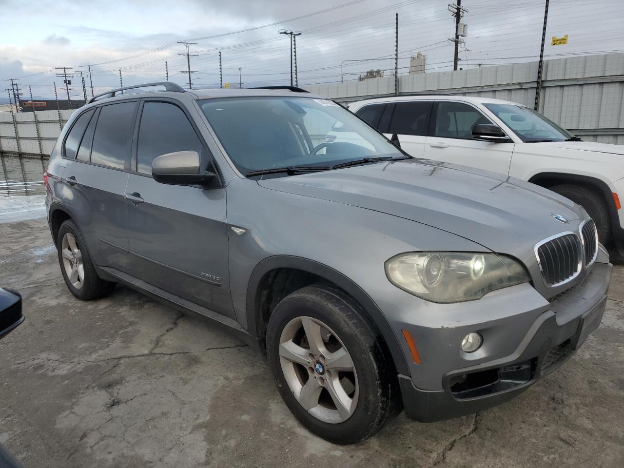 2009 BMW X5 VIN 5UXFE43509L272357 Copart auction photo, side / front end damage thumbnail 4