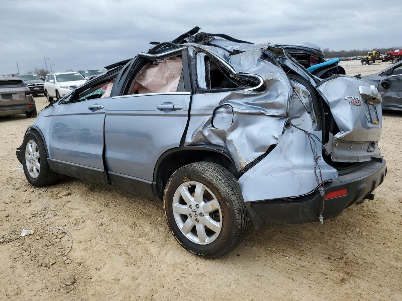 2009 Honda CR-V VIN 5J6RE387X9L027546 Copart auction photo, rollover damage thumbnail 2