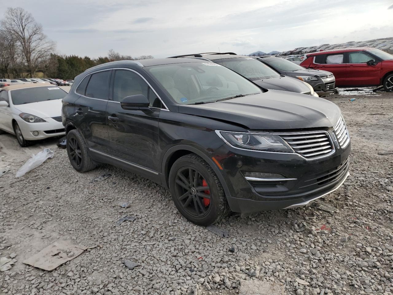 2015 Lincoln MKZ VIN 5LMCJ1A91FUJ22664 Copart auction photo, rear end / minor dent/scratches damage thumbnail 4