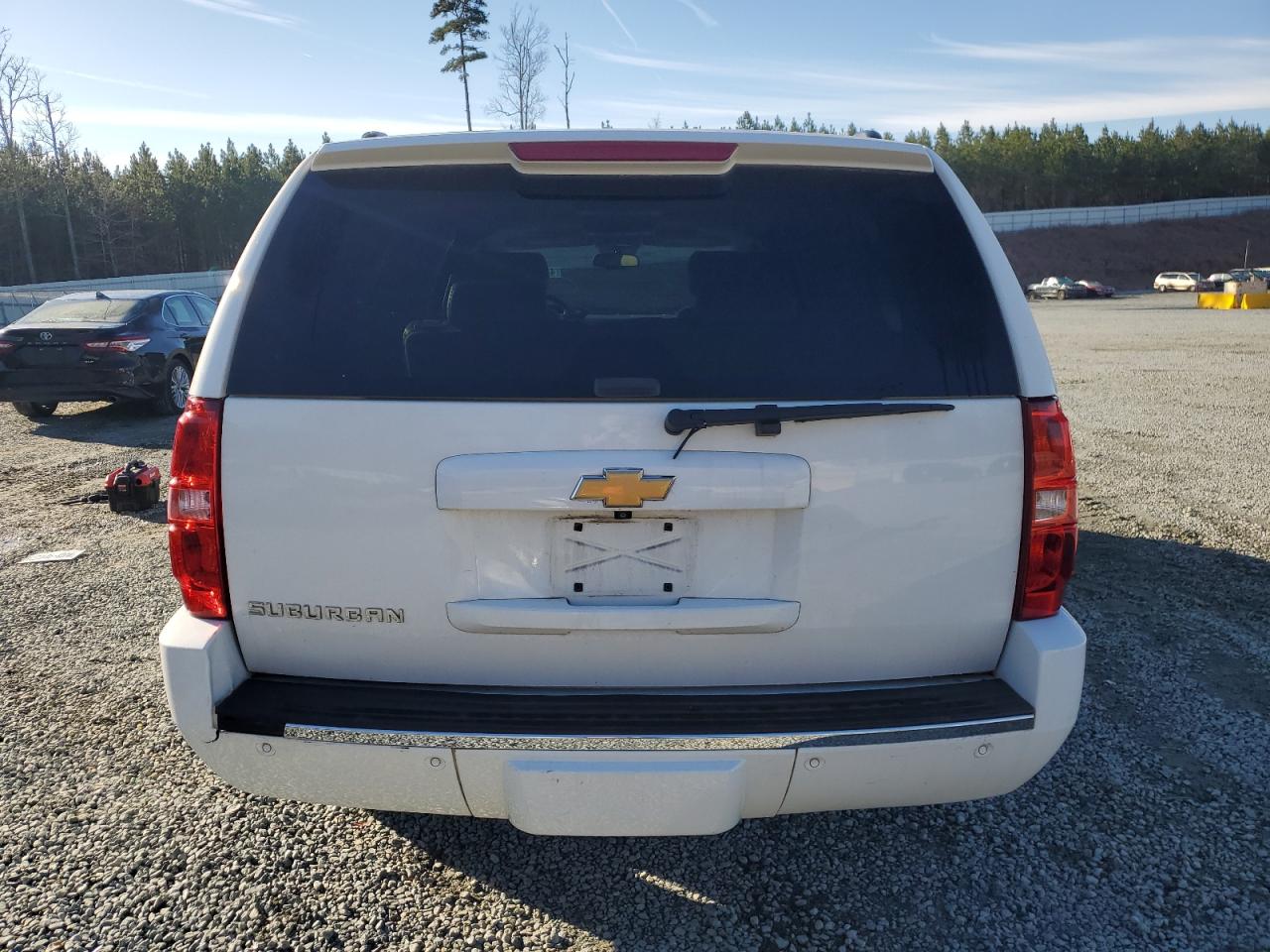 2013 Chevrolet Suburban VIN 1GNSKKE74DR271057 Copart auction photo, rear end damage thumbnail 6