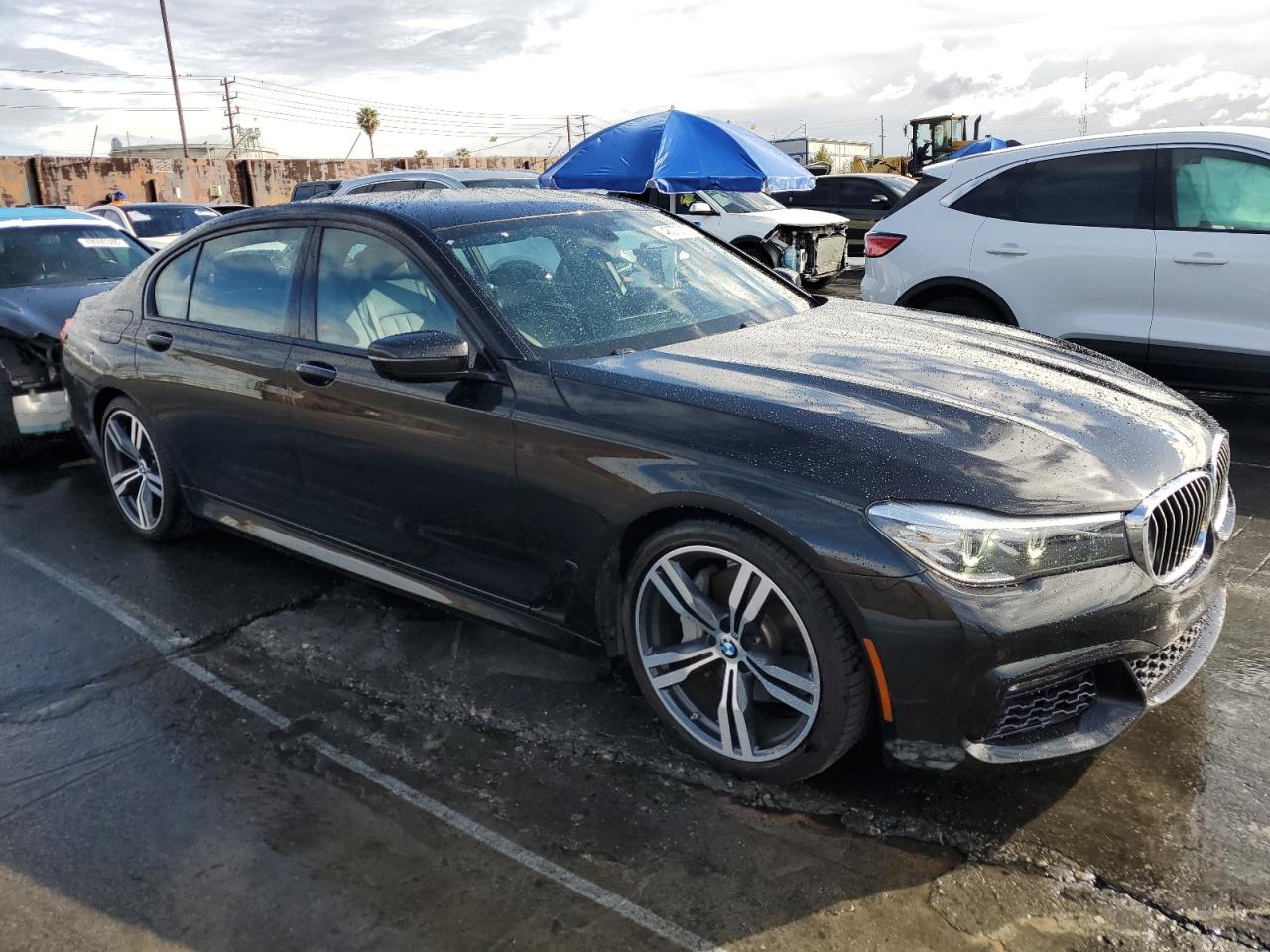 2017 BMW 7er VIN WBA7E2C59HG739788 Copart auction photo, side damage thumbnail 4