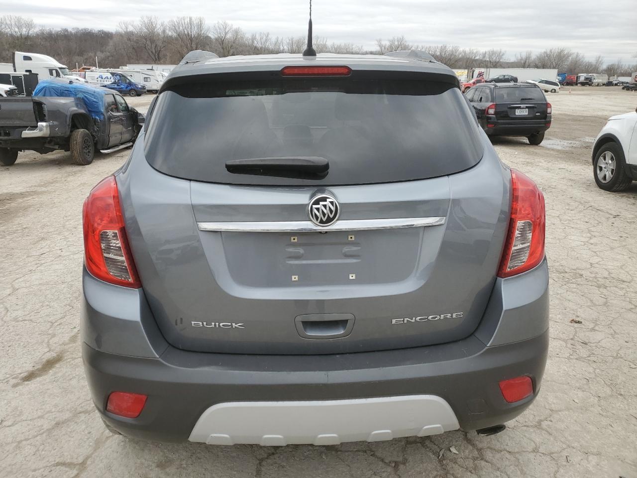 2014 Buick Encore VIN KL4CJBSB1EB775742 Copart auction photo, vandalism damage thumbnail 6