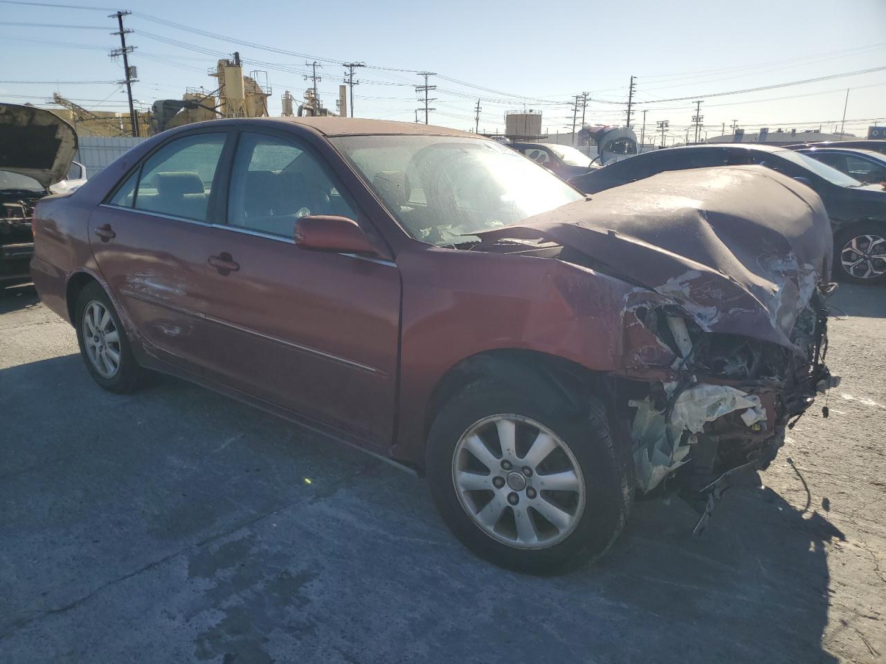 2002 Toyota Camry VIN JTDBF30K520019060 Copart auction photo, burn - engine / front end damage thumbnail 4