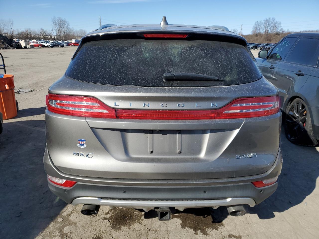 2016 Lincoln MKC VIN 5LMTJ3DH8GUJ18868 Copart auction photo, side damage thumbnail 6