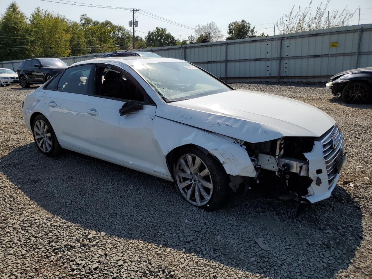 2017 Audi A4 VIN WAUGNAF49HN028553 Copart auction photo, rollover damage thumbnail 4