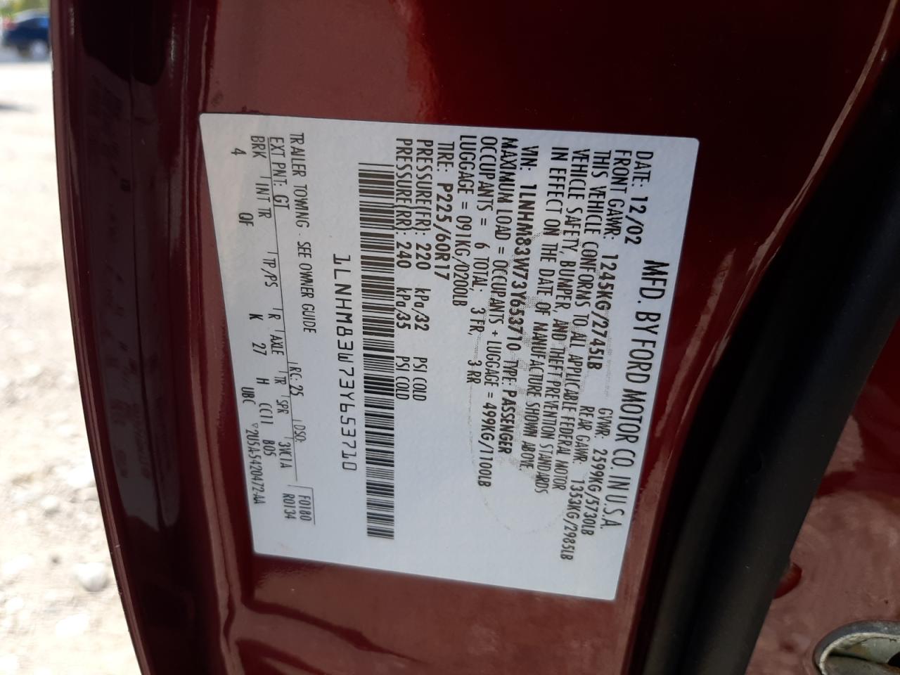2003 Lincoln Town Car VIN 1LNHM83W73Y653710 Copart auction photo, rear end damage thumbnail 12