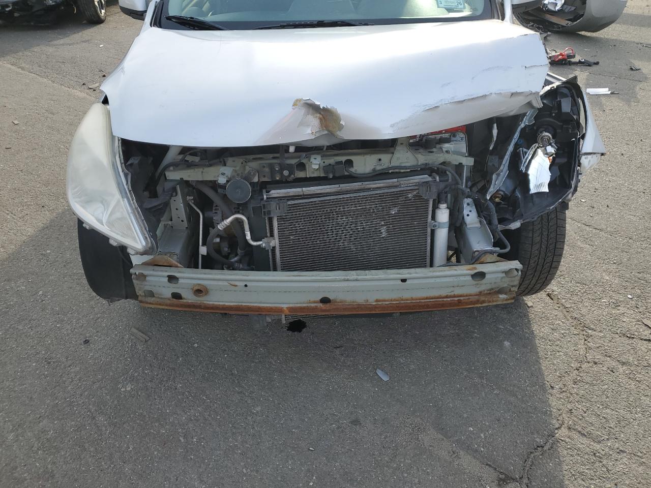 2012 Nissan Versa VIN 3N1CN7AP9CL814418 Copart auction photo, front end / minor dent/scratches damage thumbnail 13