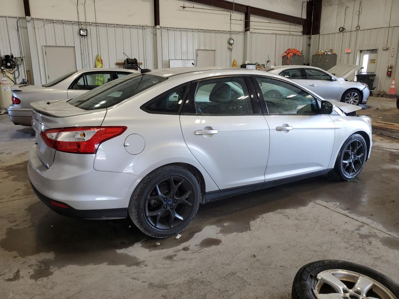 2014 Ford Focus VIN 1FADP3F29EL236035 Copart auction photo, front end damage thumbnail 3