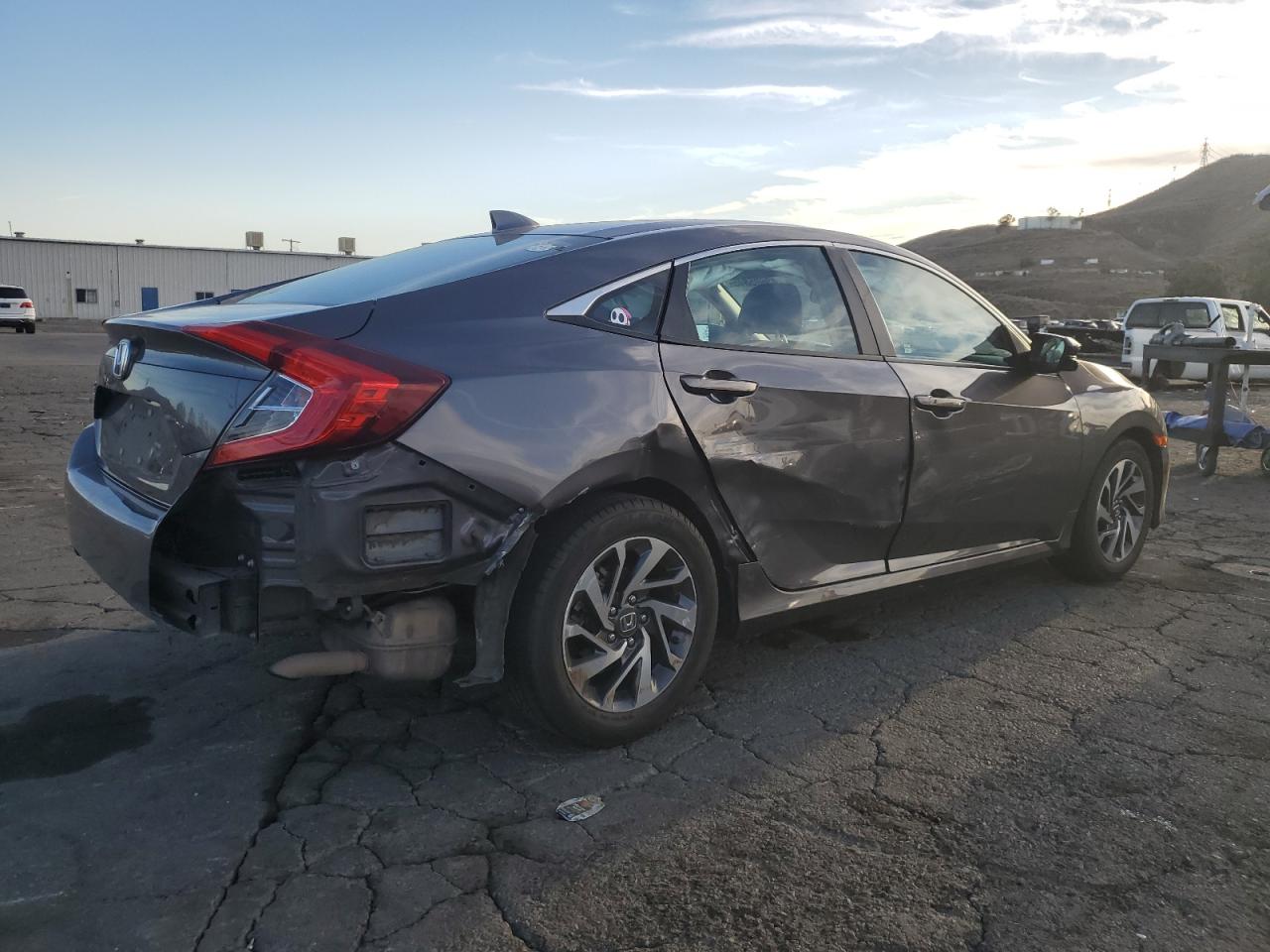 2018 Honda Civic VIN 2HGFC2F79JH503087 Copart auction photo, side / rear end damage thumbnail 3