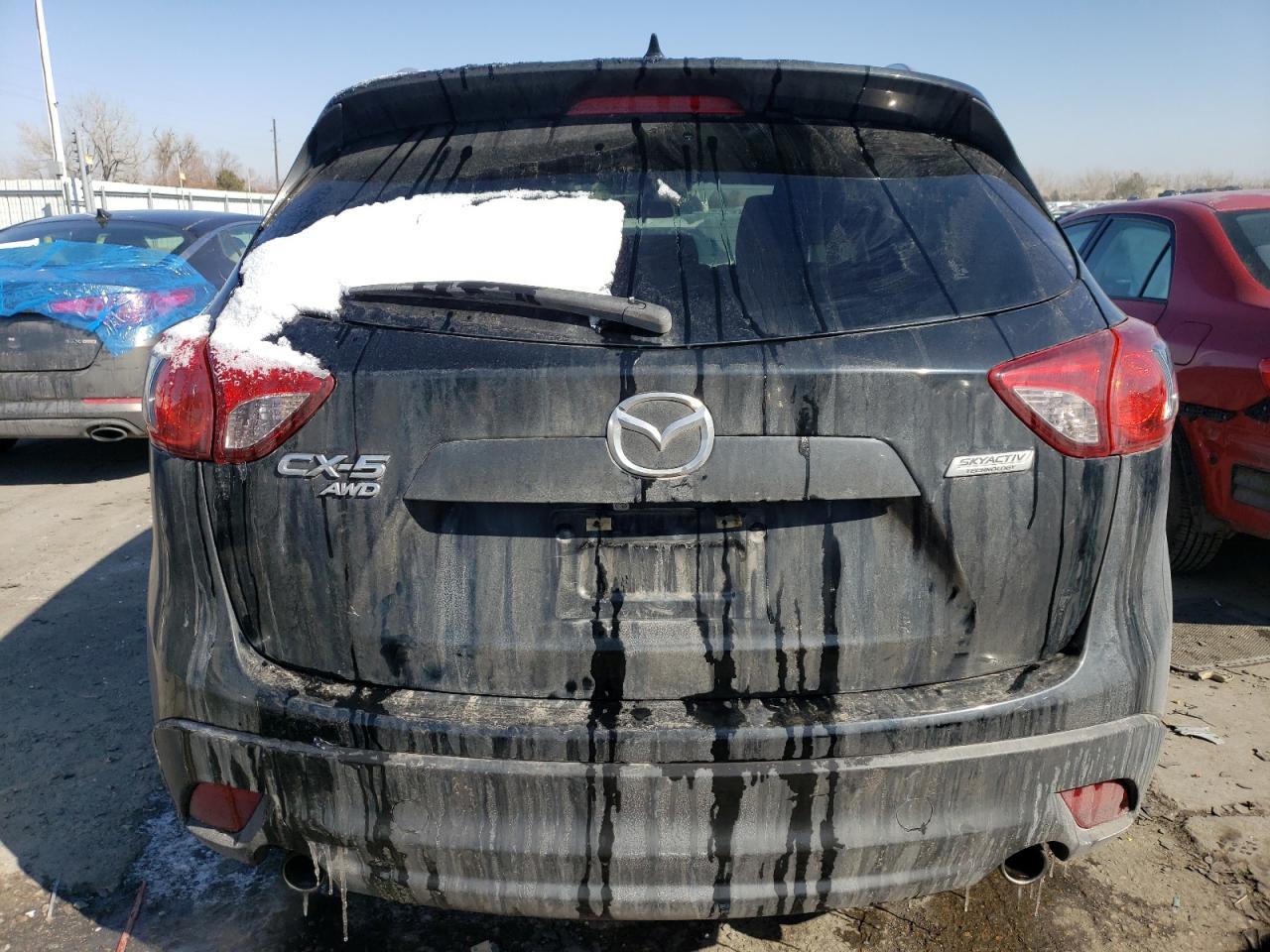 2016 Mazda CX-5 VIN JM3KE4CY1G0782670 Copart auction photo, undercarriage / hail damage thumbnail 6
