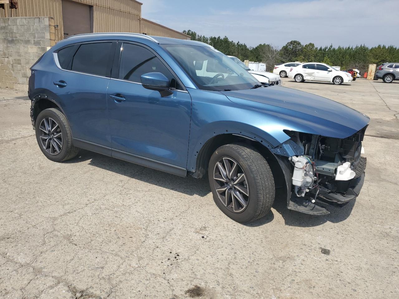 2018 Mazda CX-5 VIN JM3KFADM7J1403681 Copart auction photo, rear end damage thumbnail 4