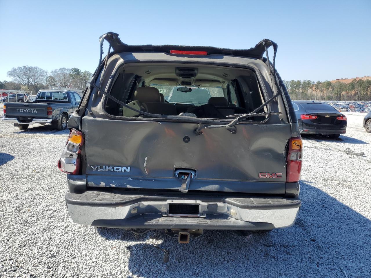2002 GMC Yukon VIN 1GKEC13V92R139024 Copart auction photo, rear end / mechanical damage thumbnail 6