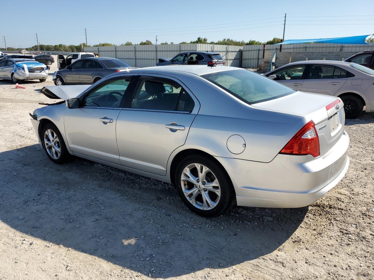 2012 Ford Fusion VIN 3FAHP0HAXCR149635 Copart auction photo, front end / rear end damage thumbnail 2