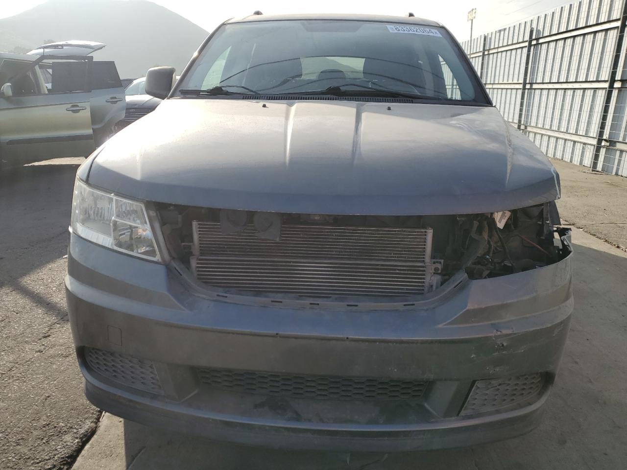 2012 Dodge Journey VIN 3C4PDCAB1CT255140 Copart auction photo, all over damage thumbnail 5