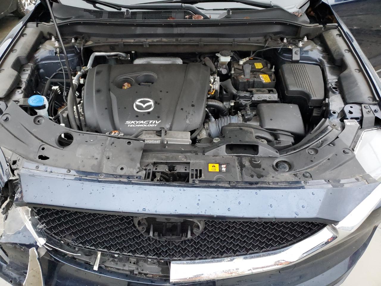 2019 Mazda CX-5 VIN JM3KFBCM7K0612904 Copart auction photo, front end / side damage thumbnail 12