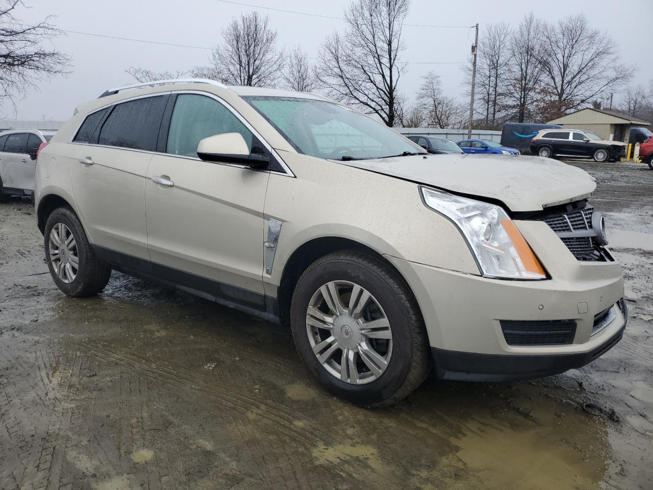 2011 Cadillac SRX VIN 3GYFNAEY9BS546947 Copart auction photo, front end / side damage thumbnail 4