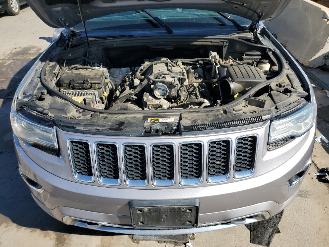 2014 Jeep Grand Cherokee VIN 1C4RJFCT0EC187131 Copart auction photo, rear end / front end damage thumbnail 12