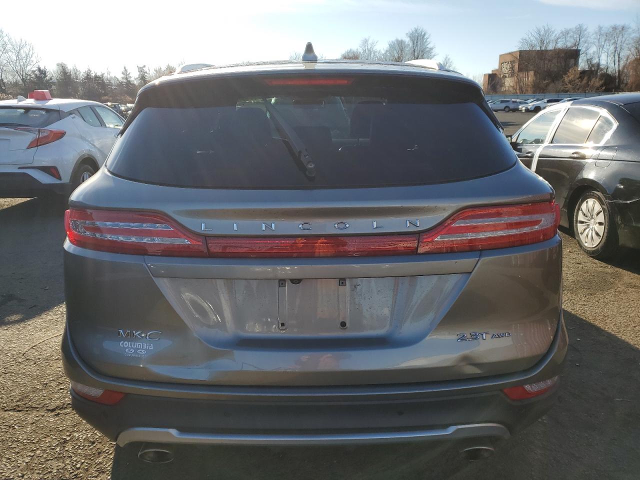 2017 Lincoln MKC VIN 5LMTJ3DHXHUL36697 Copart auction photo, side damage thumbnail 6