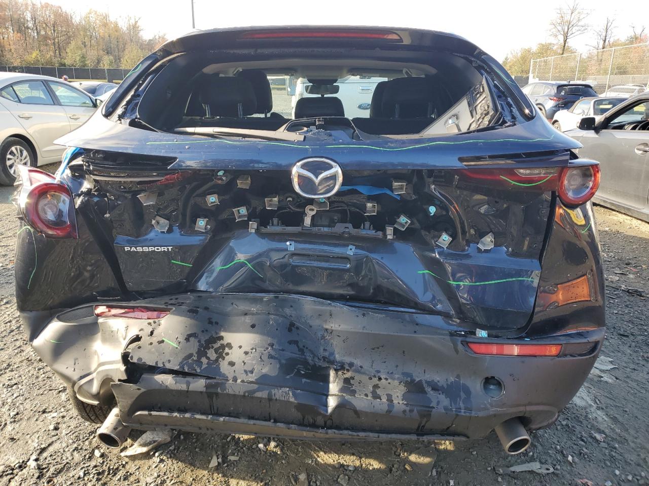 2023 Mazda CX-30 VIN 3MVDMBBMXPM581126 Copart auction photo, rear end damage thumbnail 6