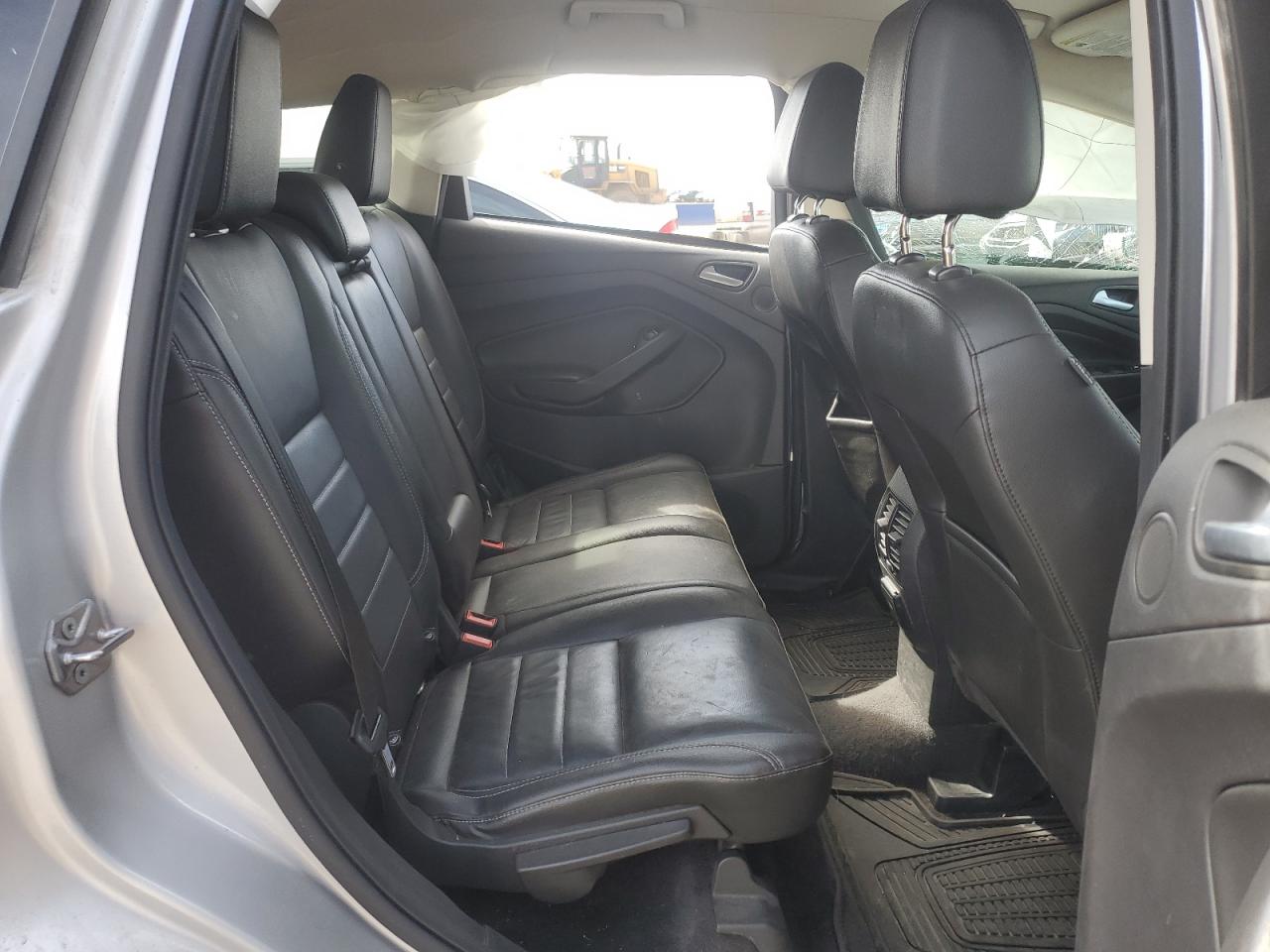 2015 Ford Escape VIN 1FMCU9J98FUC62719 Copart auction photo, side / rear end damage thumbnail 12