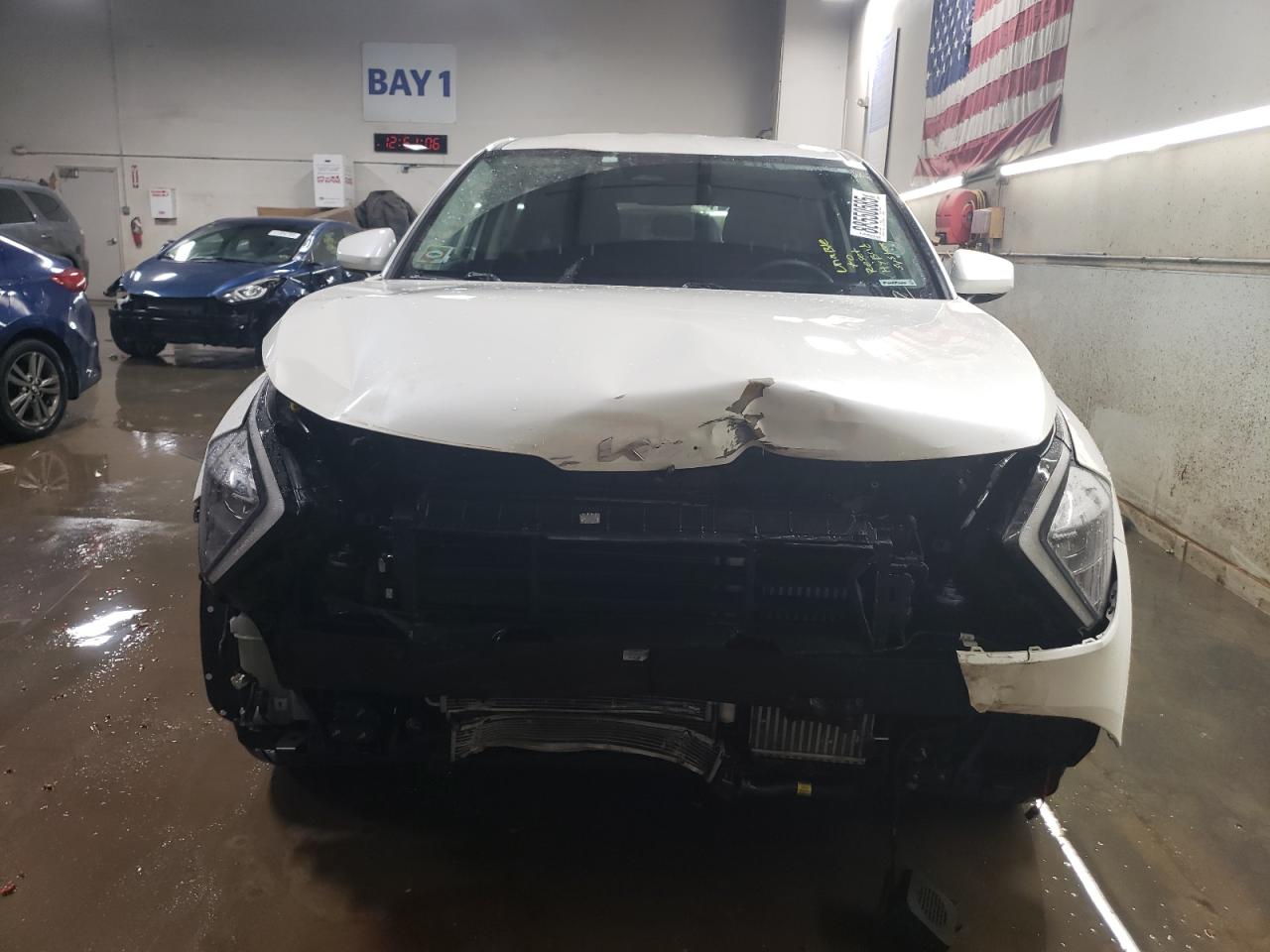 2023 KIA Sportage VIN KNDPUCAG4P7082445 Copart auction photo, front end damage thumbnail 5