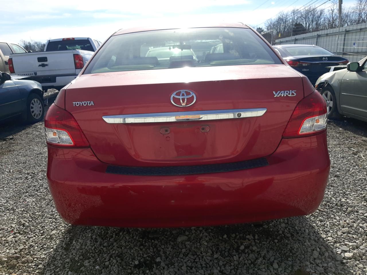 2009 Toyota Yaris VIN JTDBT903791311267 Copart auction photo, front end damage thumbnail 6