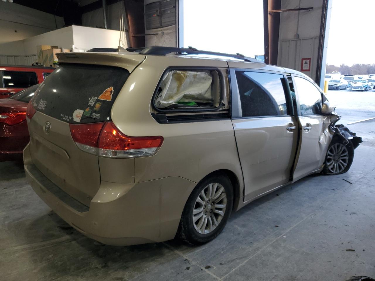 2011 Toyota Sienna VIN 5TDYK3DCXBS126918 Copart auction photo, front end / all over damage thumbnail 3