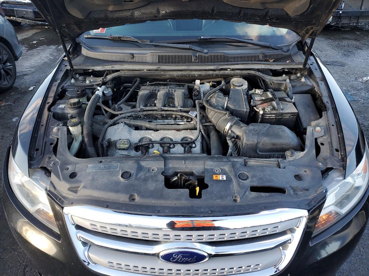 2011 Ford Taurus VIN 1FAHP2EW8BG168895 Copart auction photo, undercarriage / minor dent/scratches damage thumbnail 11