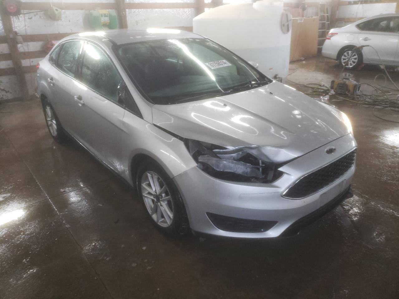 2016 Ford Focus VIN 1FADP3F21GL377555 Copart auction photo, front end damage thumbnail 4