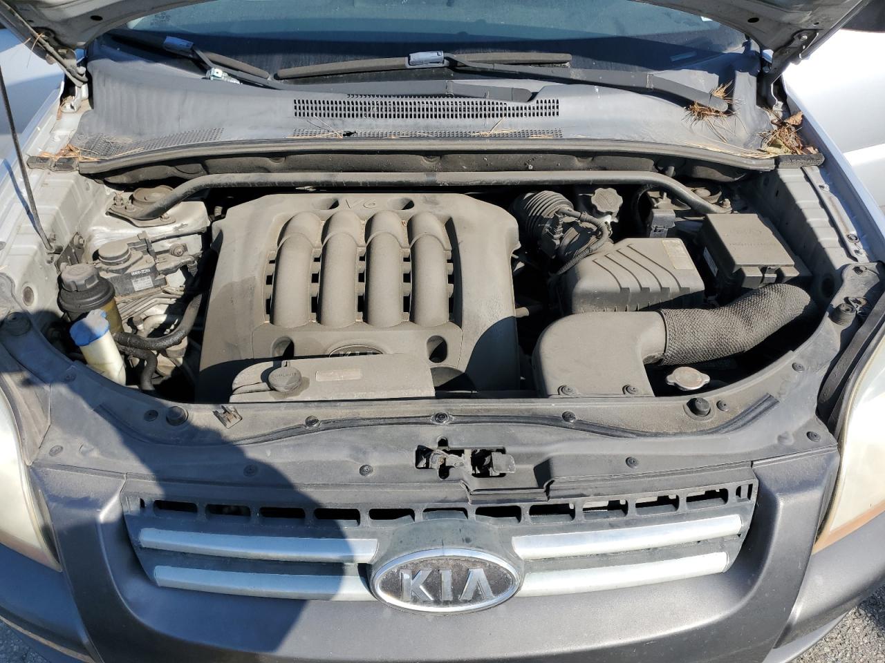 2007 KIA Sportage VIN KNDJF723777318301 Copart auction photo, vandalism damage thumbnail 12