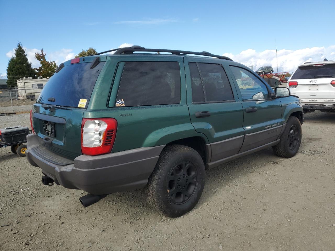 1999 Jeep Grand Cherokee VIN 1J4GW58S0XC700054 Copart auction photo, all over damage thumbnail 3