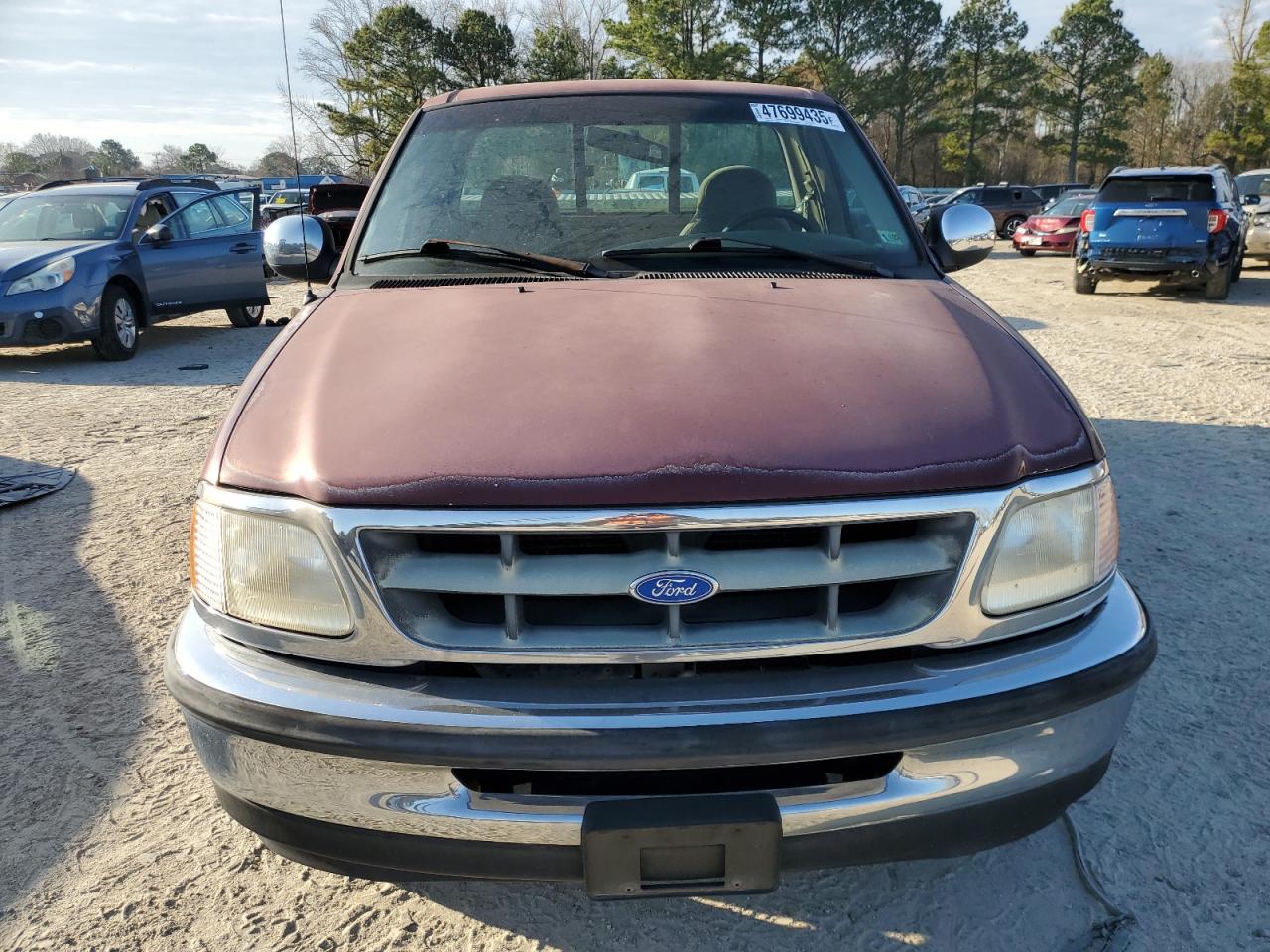1997 Ford F-150 VIN 1FTDF17W6VND23155 Copart auction photo, side / minor dent/scratches damage thumbnail 5