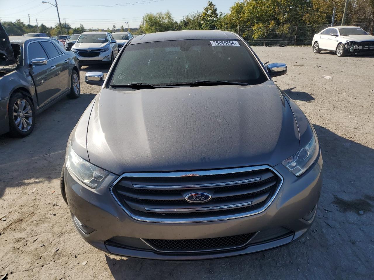 2014 Ford Taurus VIN 1FAHP2F85EG115348 Copart auction photo, front end / minor dent/scratches damage thumbnail 5
