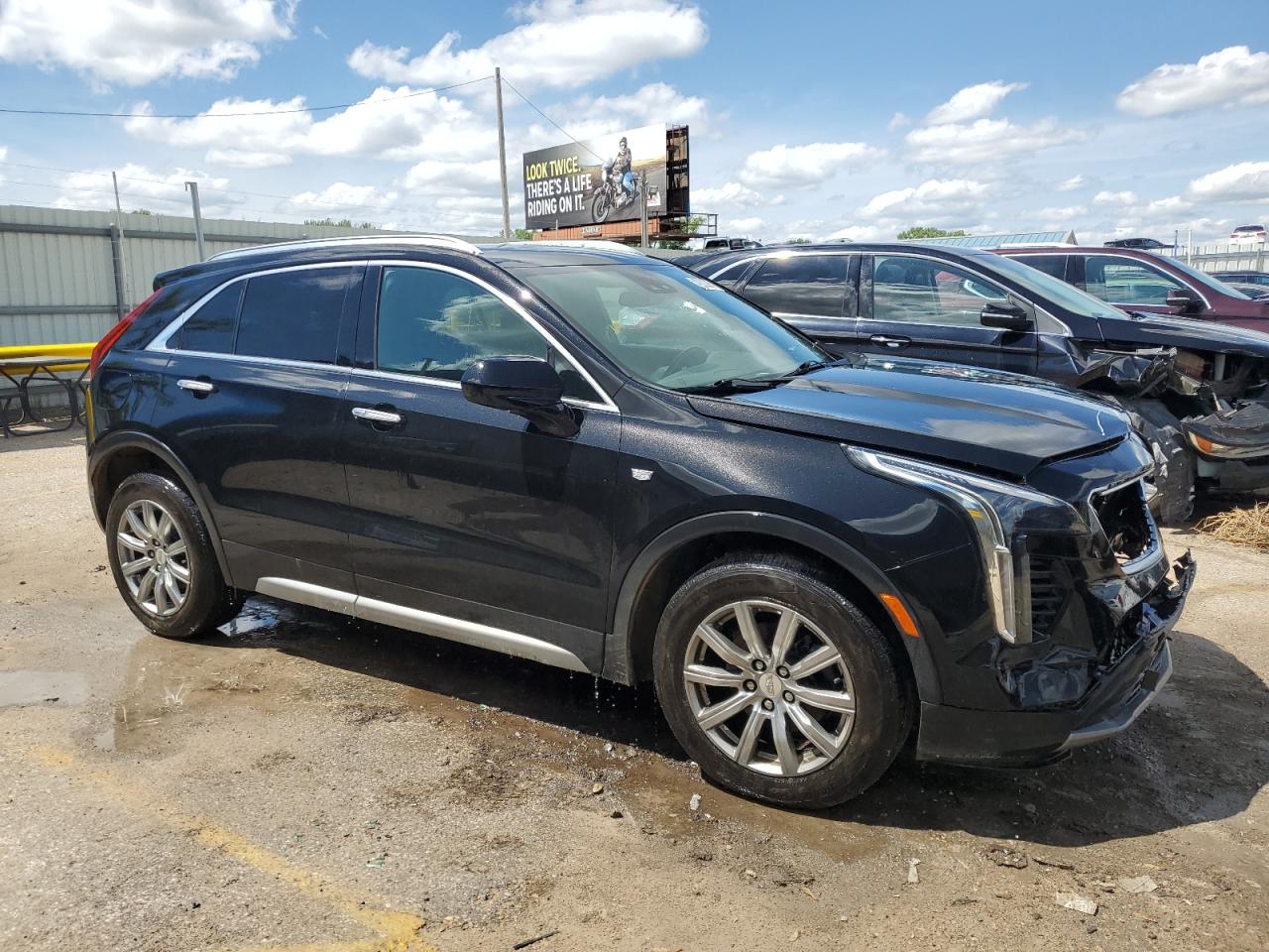 2020 Cadillac XT4 VIN 1GYFZDR47LF088070 Copart auction photo, front end damage thumbnail 4
