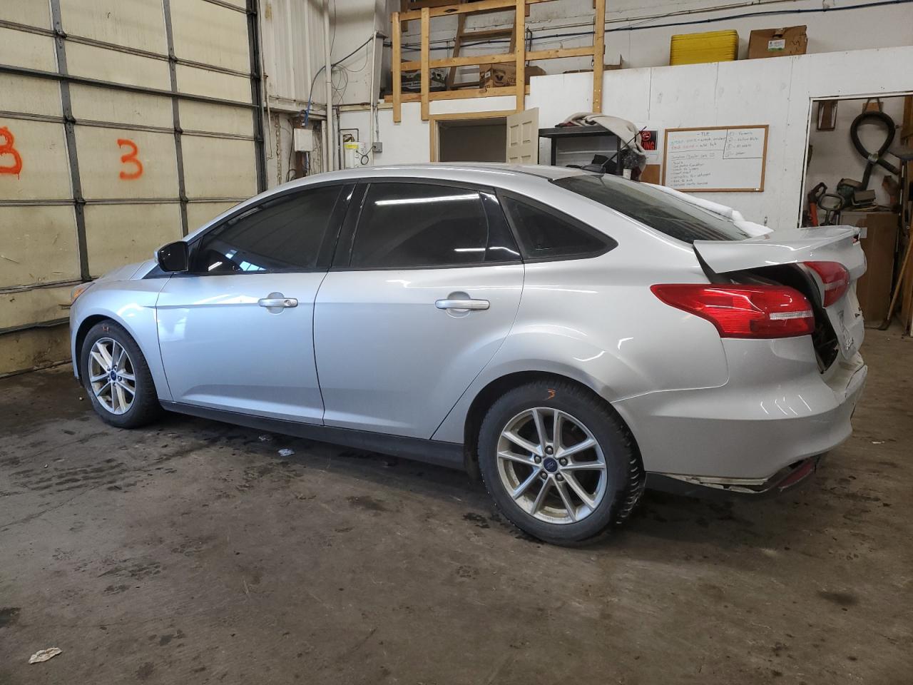 2016 Ford Focus VIN 1FADP3F26GL282201 Copart auction photo, rear end damage thumbnail 2