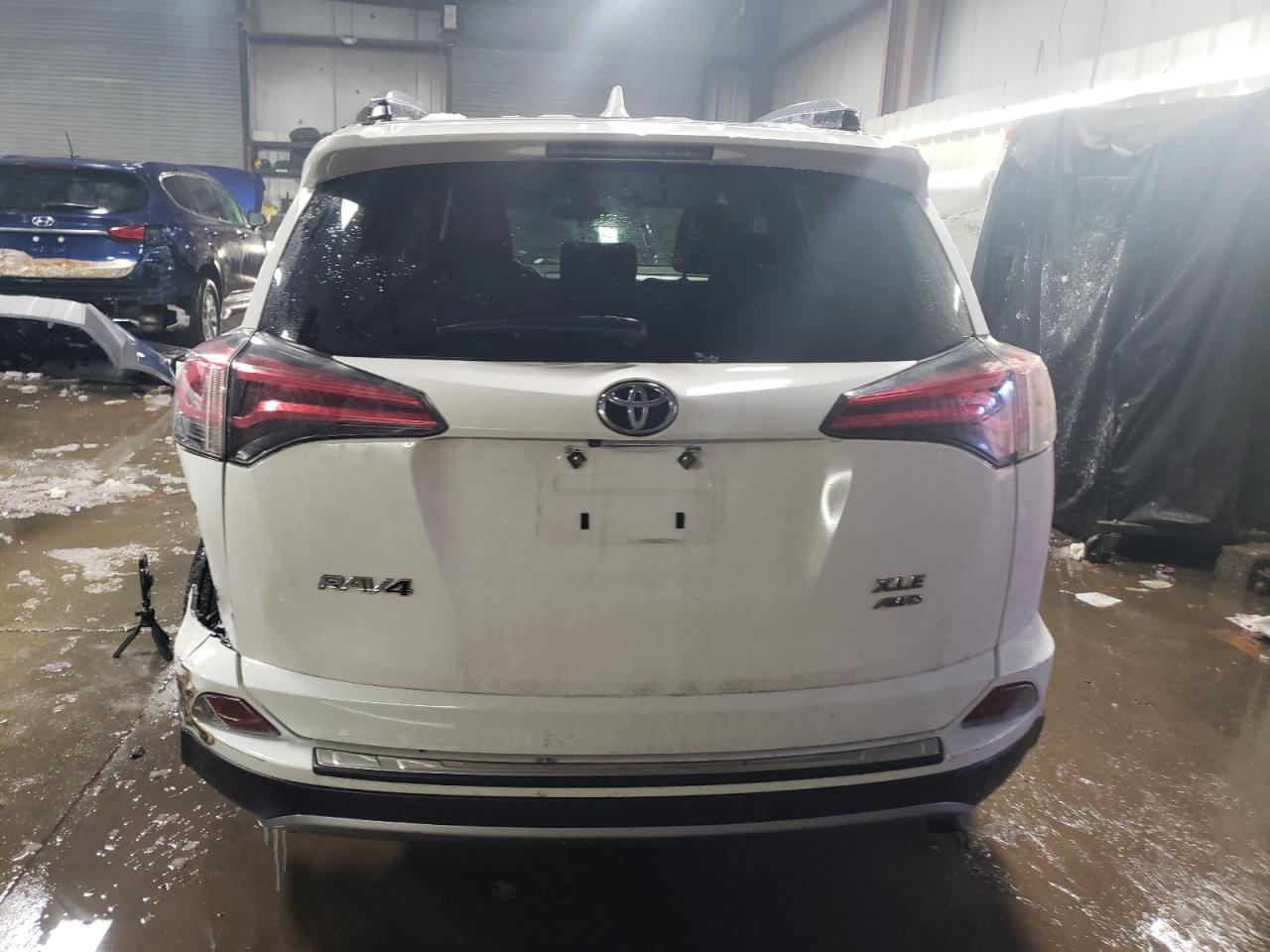 2017 Toyota RAV 4 VIN JTMRFREV8HD202250 Copart auction photo, rear end / vandalism damage thumbnail 6