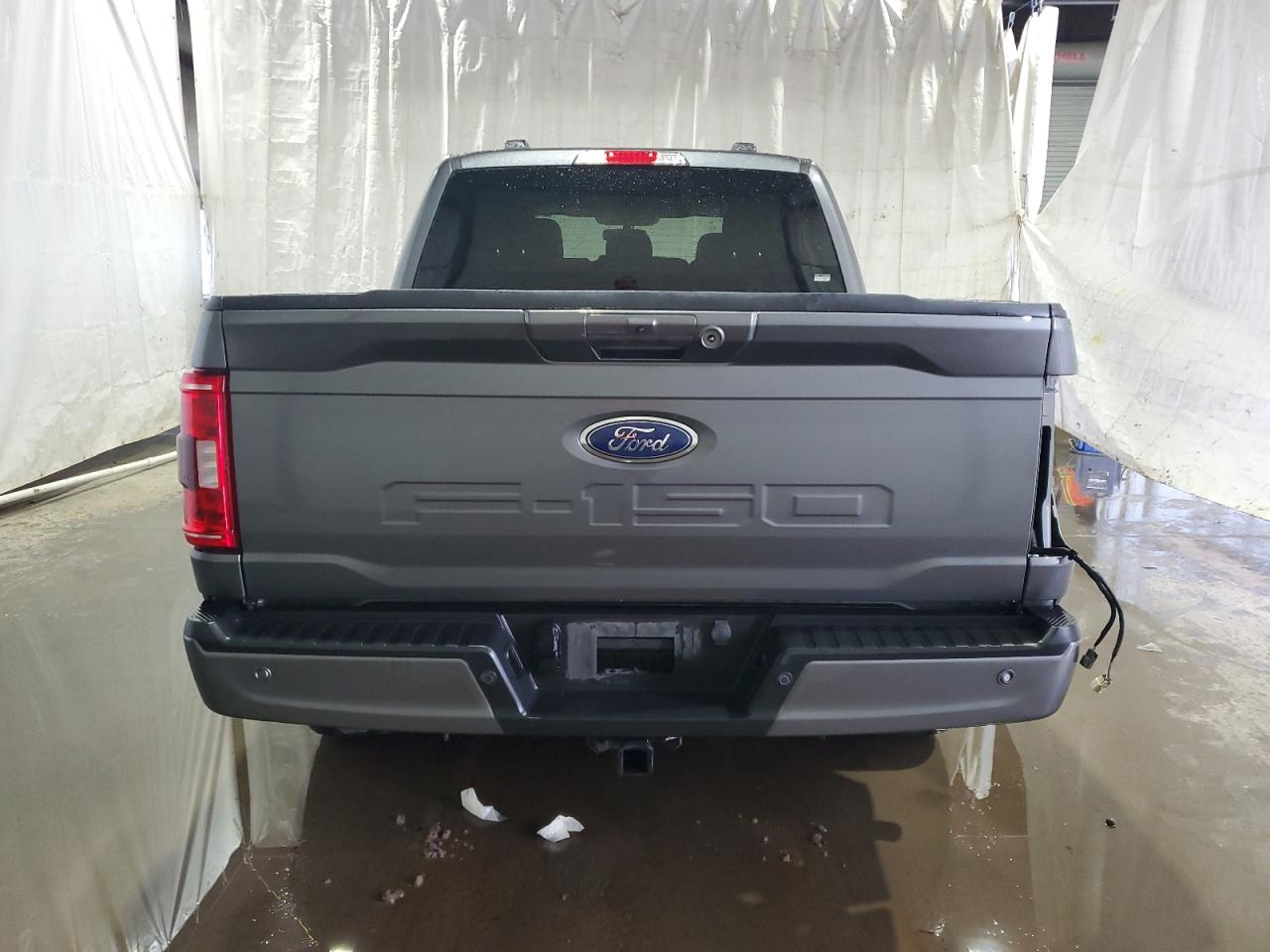 2023 Ford F-150 VIN 1FTFW1E51PFB57482 Copart auction photo, front end / rear end damage thumbnail 6