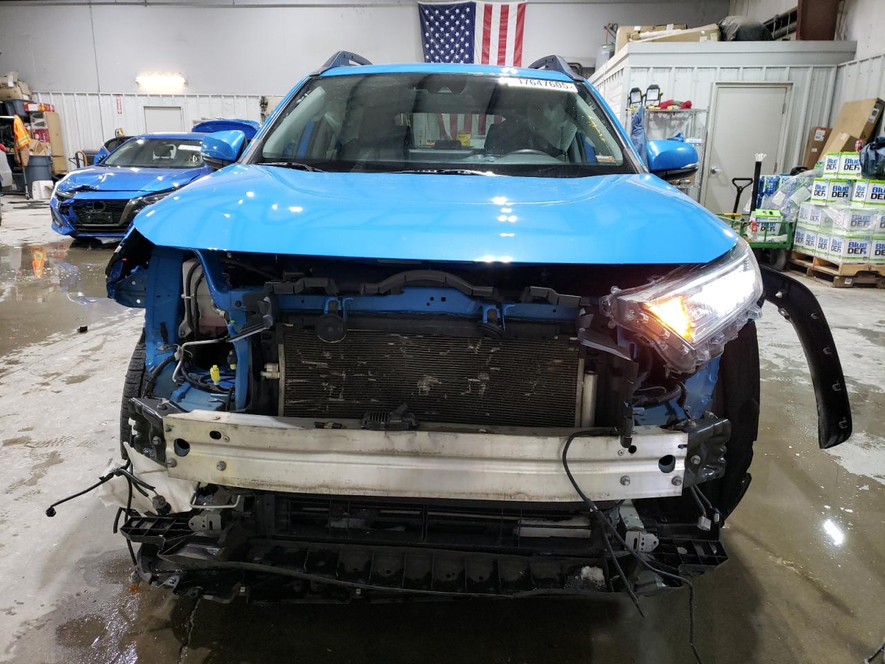 2019 Toyota RAV 4 VIN 2T3J1RFV3KC059990 Copart auction photo, front end / hail damage thumbnail 5
