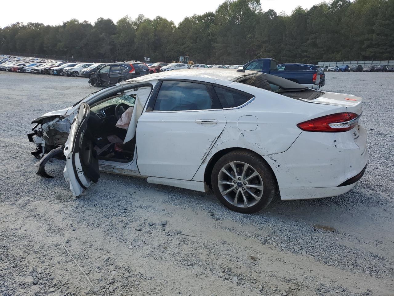 2017 Ford Fusion VIN 3FA6P0H79HR355709 Copart auction photo, rollover damage thumbnail 2