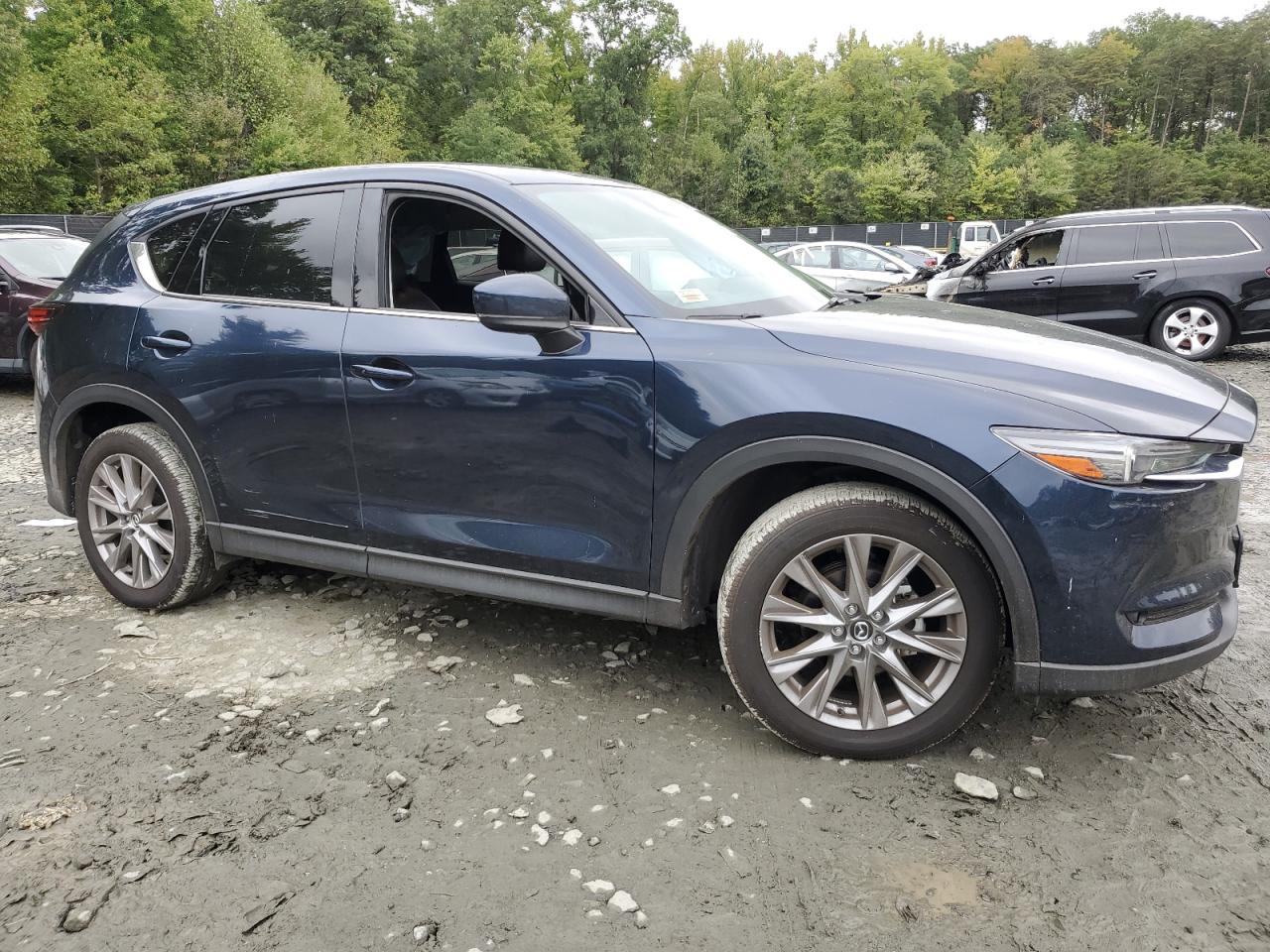 2021 Mazda CX-5 VIN JM3KFBDM7M1340107 Copart auction photo, side damage thumbnail 4
