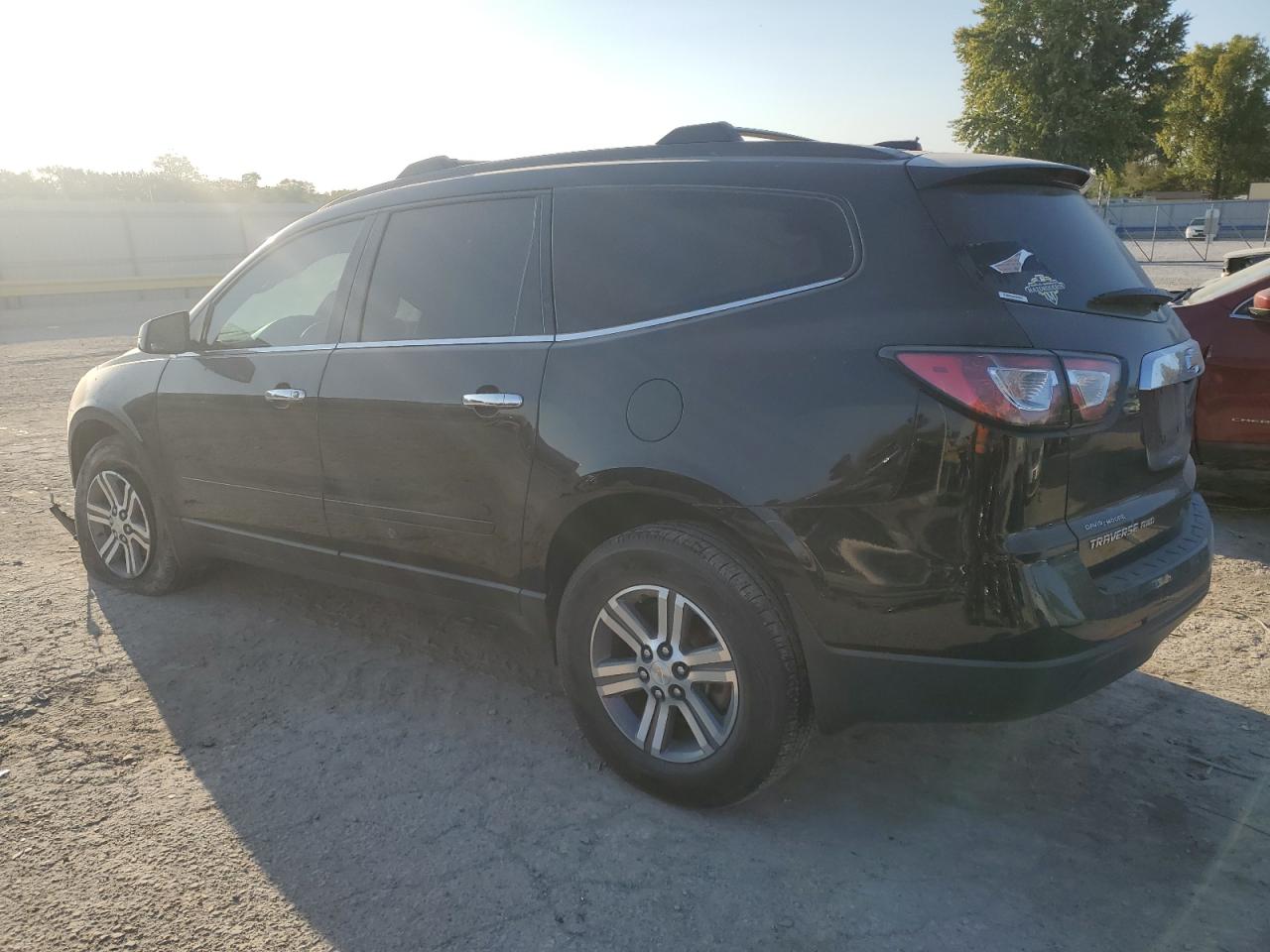 2017 Chevrolet Traverse VIN 1GNKVGKD1HJ222627 Copart auction photo, side / front end damage thumbnail 2
