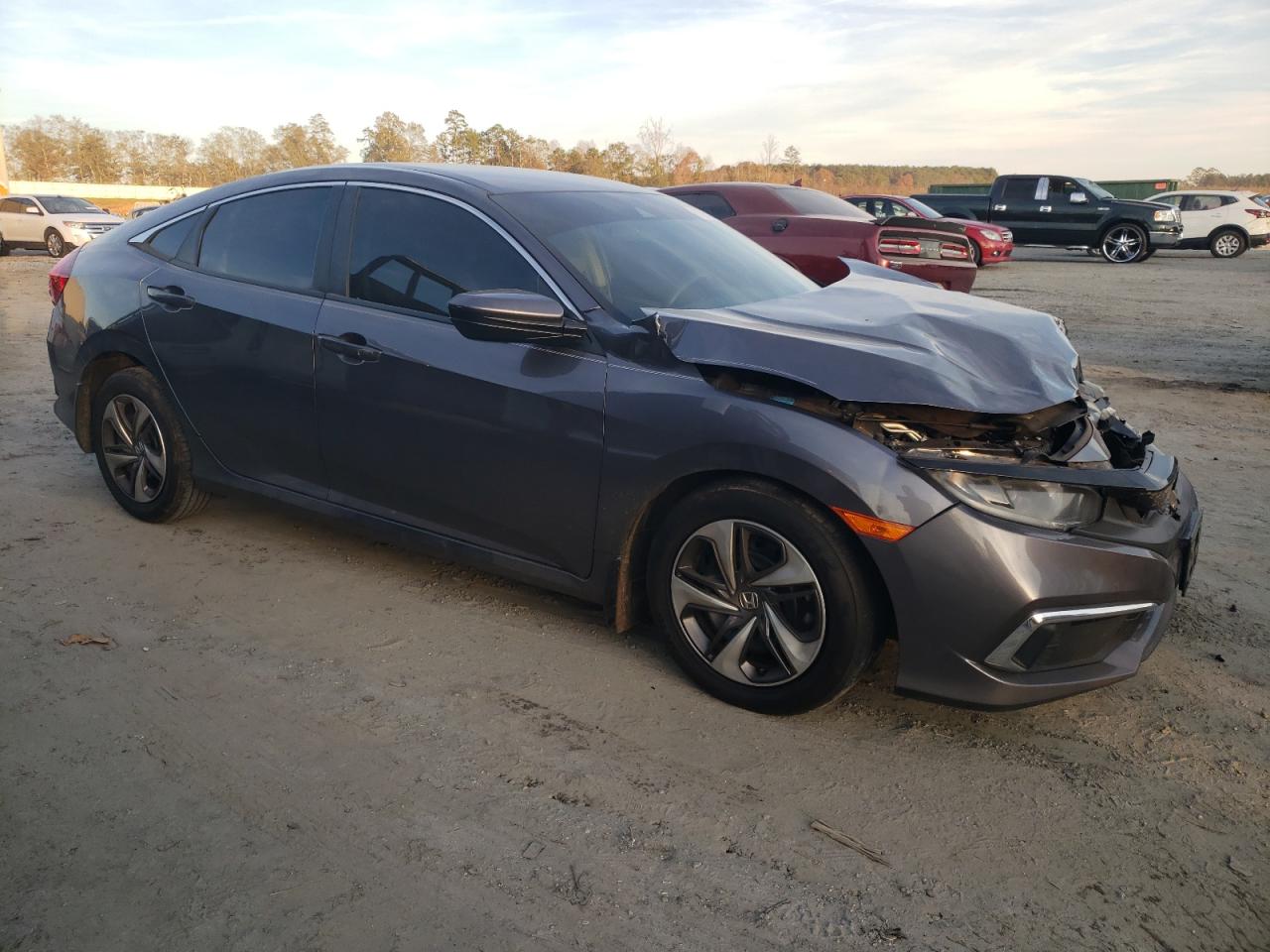 2019 Honda Civic VIN 19XFC2F6XKE028049 Copart auction photo, front end / side damage thumbnail 4