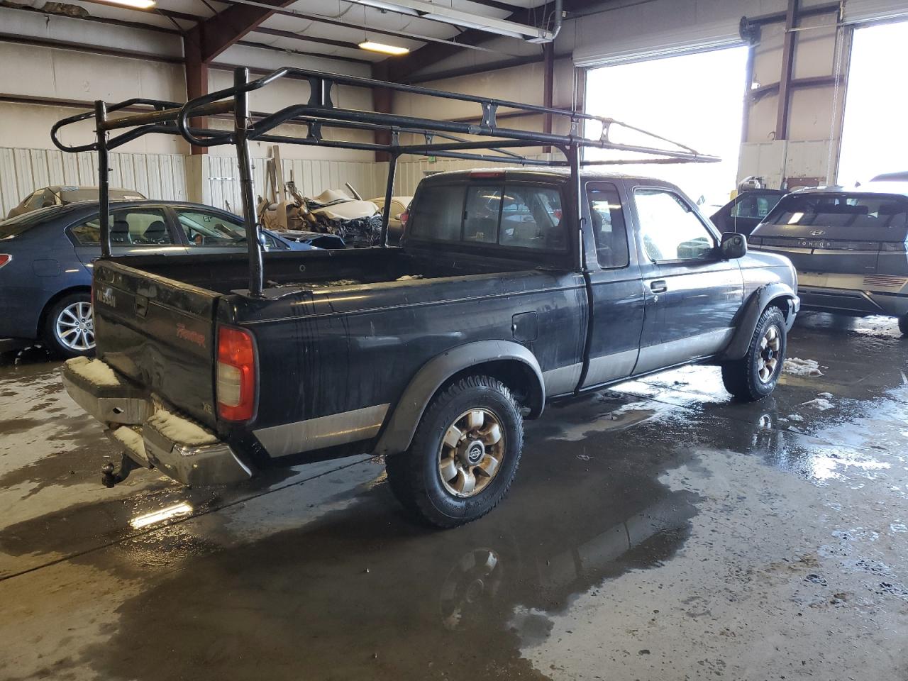1998 Nissan Navara (Frontier) VIN 1N6DD26Y0WC333060 Copart auction photo, rear end / damage history damage thumbnail 3