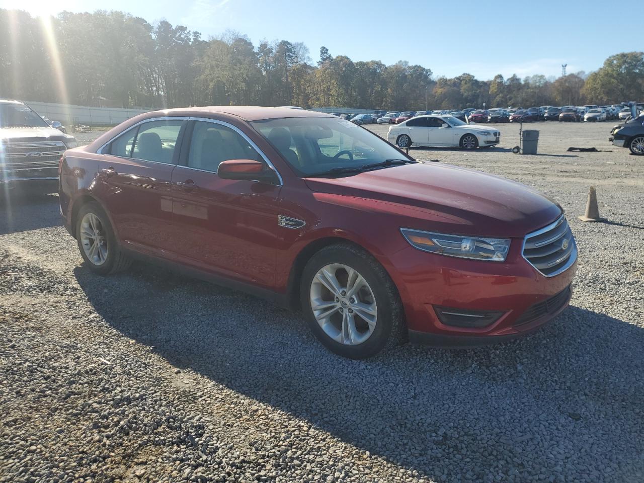 2015 Ford Taurus VIN 1FAHP2H83FG194761 Copart auction photo, burn / rear end damage thumbnail 4
