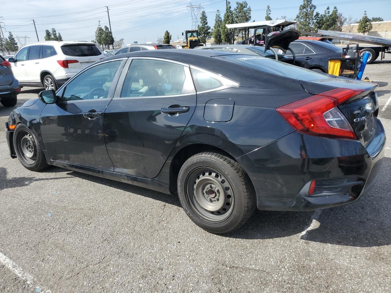 2017 Honda Civic VIN 2HGFC2F58HH563015 Copart auction photo, undercarriage / all over damage thumbnail 2
