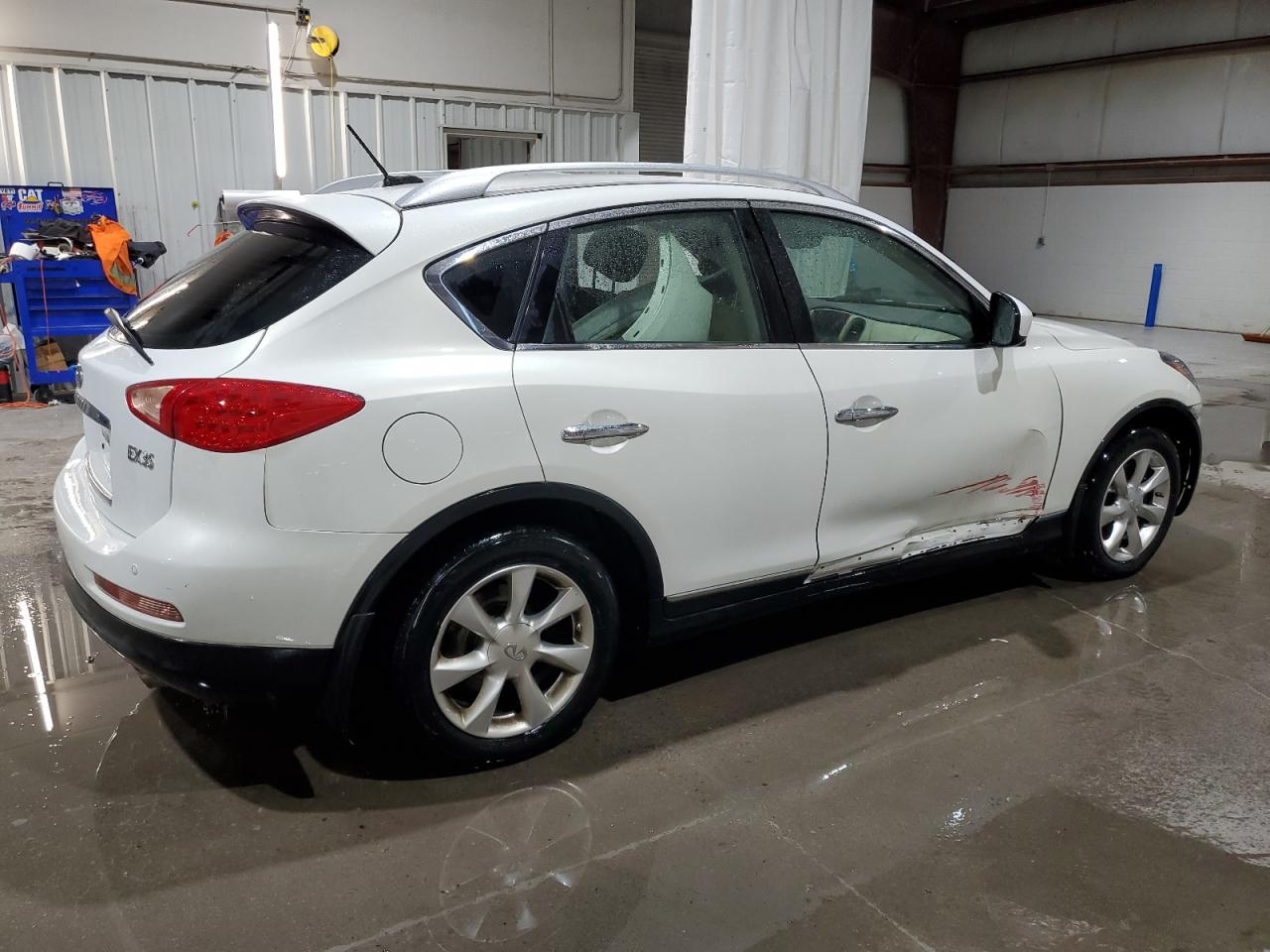 2010 Infiniti EX VIN JN1AJ0HR8AM750733 Copart auction photo, side / front end damage thumbnail 3