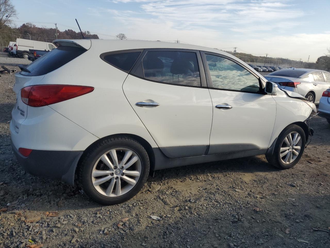 2012 Hyundai Tucson VIN KM8JUCAC0CU355018 Copart auction photo, front end / minor dent/scratches damage thumbnail 3
