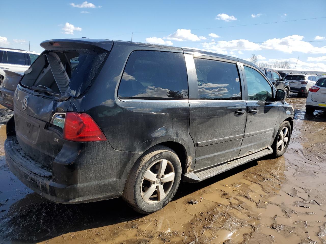2009 Volkswagen Routan VIN 2V8HW34199R559639 Copart auction photo, rear end / side damage thumbnail 3