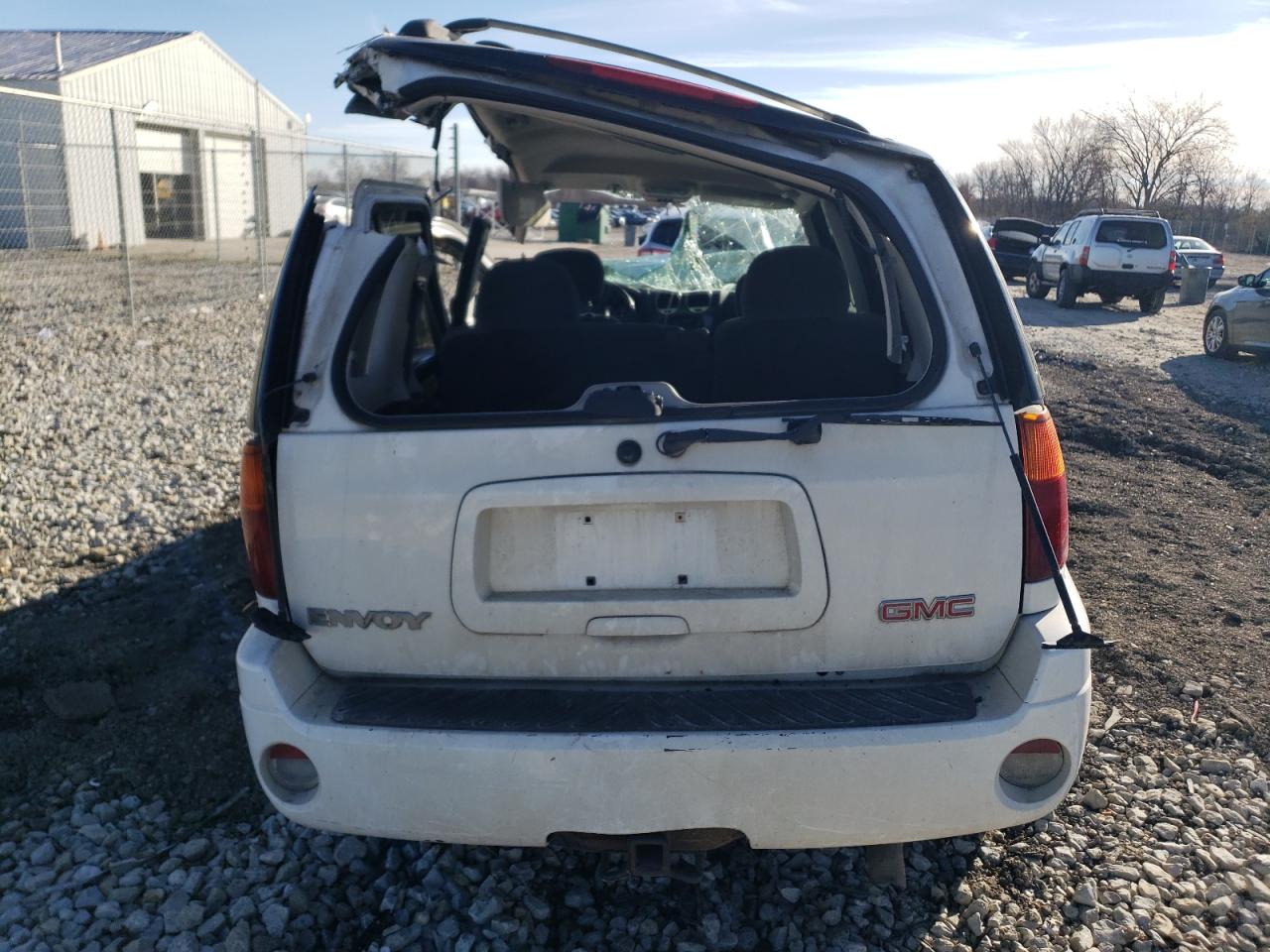 2005 GMC Envoy VIN 1GKDT13S252344795 Copart auction photo, top/roof / all over damage thumbnail 6