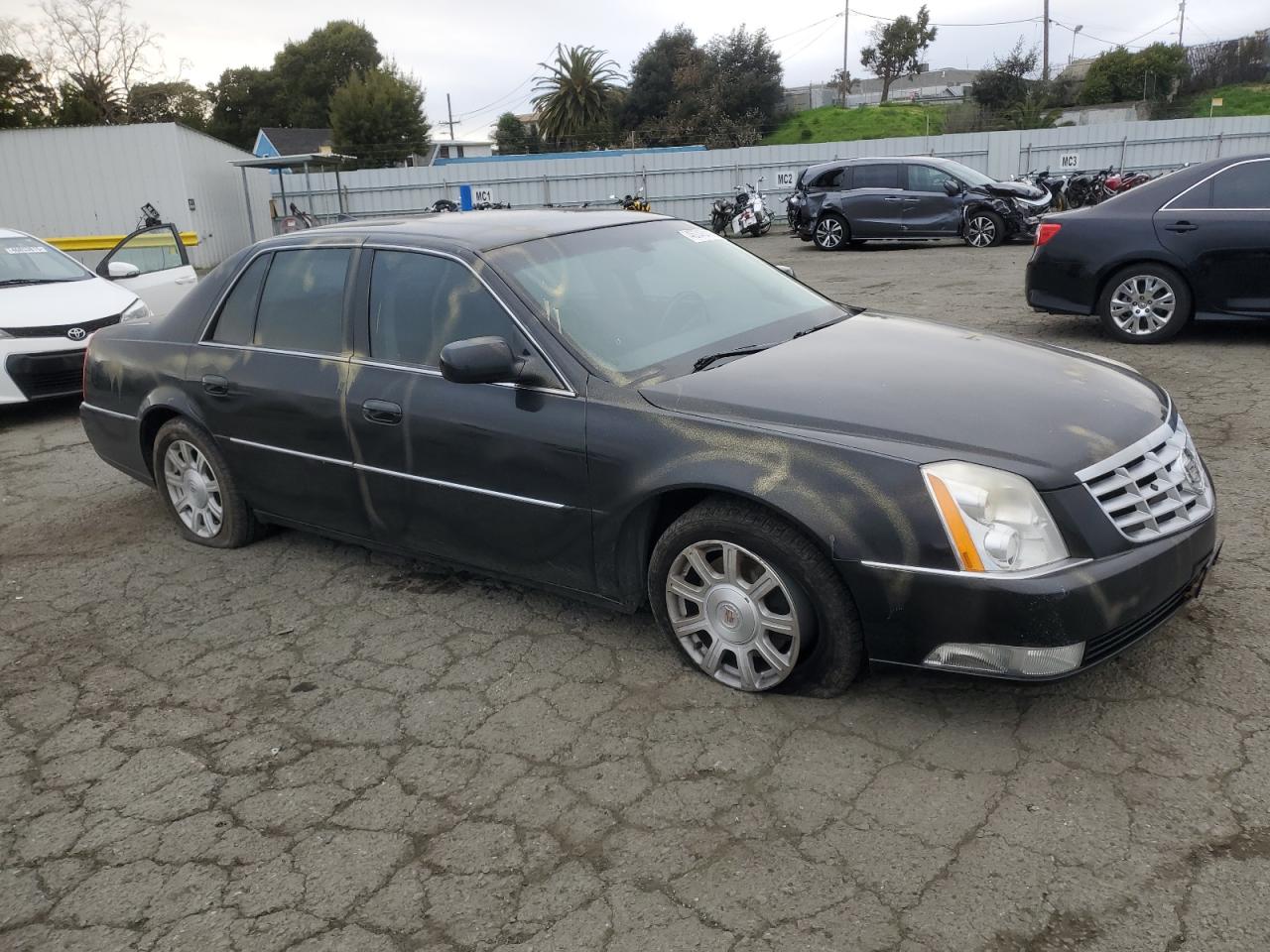2010 Cadillac DTS VIN 1G6KA5EY7AU116648 Copart auction photo, vandalism damage thumbnail 4